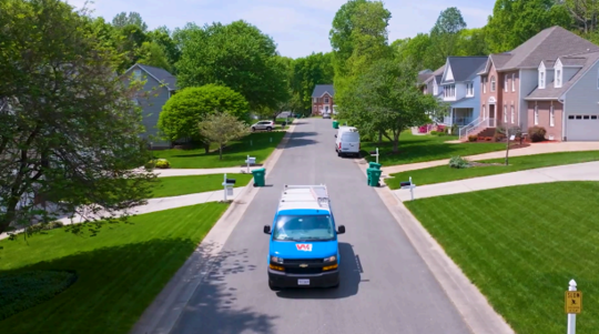 van driving down road